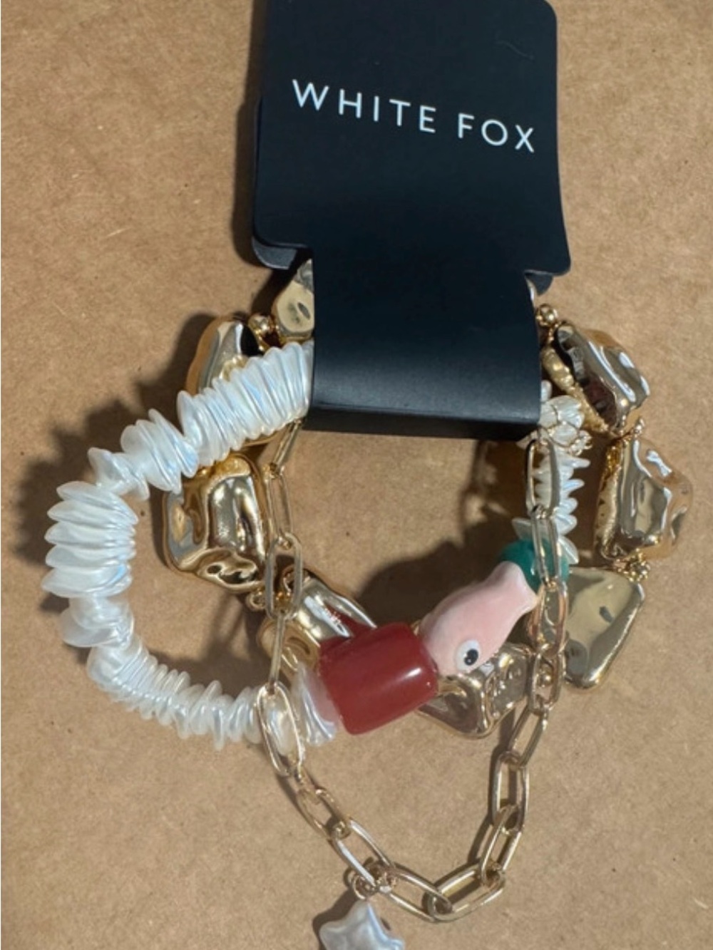 White Fox Boutique Multi-Chain Bracelet in Gold, White & Red